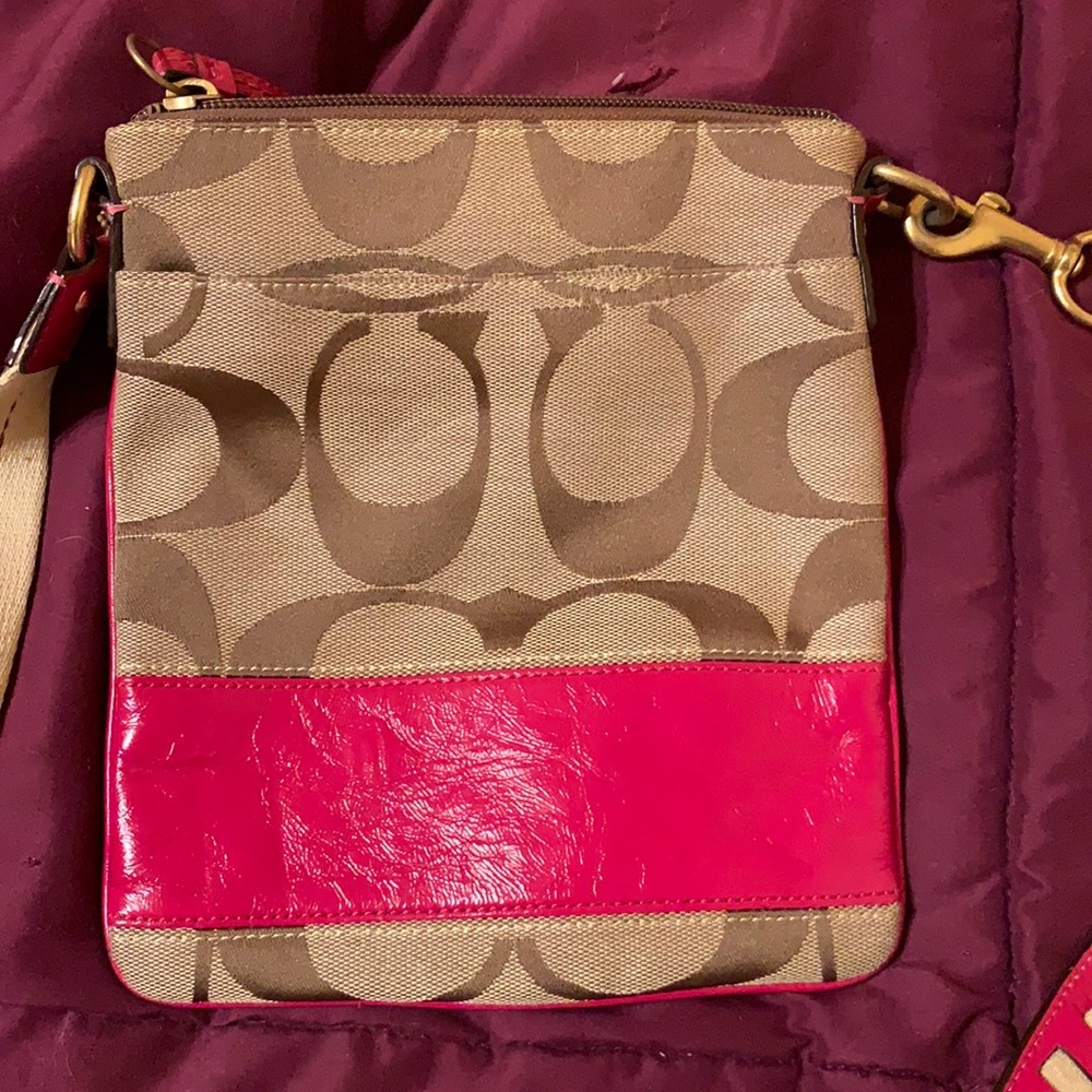 Small, women’s cross body Coach purse